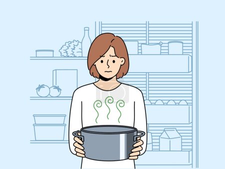 Frustrated woman housewife with pot of sour soup, feels bad smell from food spoiled due to violation of sanitary rules. Girl is standing in kitchen and holding stinking soup in bewilderment