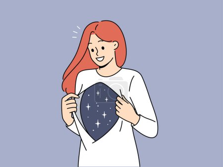 Woman shows depth of soul and inner world with smile, showing stars under shirt. Concept of caring for your own soul and inner harmony achieved through meditation or getting rid of stress