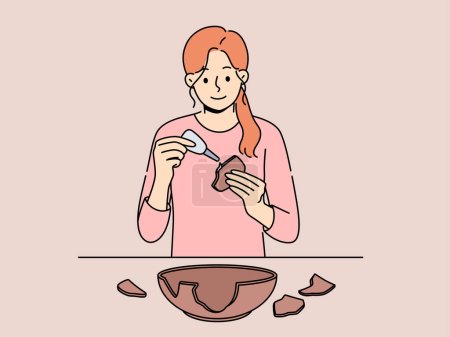 Woman seals broken clay plate to hide carelessness or demonstrate conscious consumption. Girl archaeologist with smile uses glue restoring clay dishes found at excavations for display in museum.