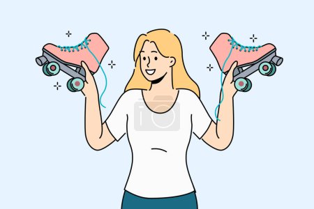 Woman holds retro roller skates, inviting you to ride together in park in fresh air. Smiling girl with vintage shoes with wheels in hands recommends buying roller skates for active lifestyle