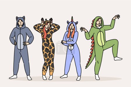 Pajama party for men and women in cute animal costumes for comfortable, restful sleep. Positive guys and girls prepared for masquerade on theme of pajama party, posing smiling in full length