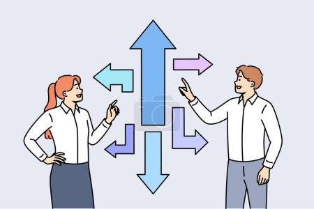 Business team looking for strategic path and solution to achieve success standing near different arrows. Man and woman choose one of options to achieve strategic goals of corporation