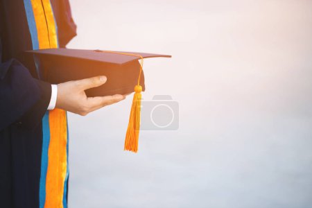 Photo for Graduation,Student hold hats in hand during commencement success graduates of the university,Concept education congratulation.Graduation Ceremony,Congratulated the graduates in University. - Royalty Free Image