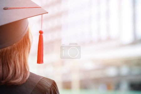Photo for Close up hat young women  backside group crowd of new graduates during commencement. Concept education congratulation. Graduation Ceremony in University - Royalty Free Image