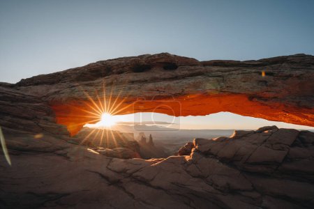 View through Natural Arch, Mesa Arch, Sunrise, Grand View Point Road, Island in the Sky, Canyonlands National Park, Moab, Utah, USA, North America. Photo taken in USA.