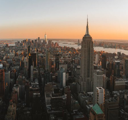 Photo for Aerial view of Midtown and lower Manhattan New York City Downtown. Soft morning light sunrise. Financial distict United States. Photo taken in USA. - Royalty Free Image