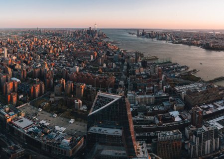 Photo for Aerial view of Midtown and lower Manhattan New York City Downtown. Soft morning light sunrise. Financial distict United States. Photo taken in USA. - Royalty Free Image
