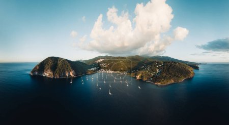 Photo for Aerial drone Panorama of Guadeloupe. beach drone sunset view. Harbor bay aerial view in Marigot with sailboats. Travel concept for beach vacation. Guadeloupe. - Royalty Free Image