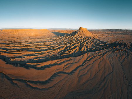 Photo for Factory Butte in the Caineville Badlands of Utah. Aerial drone panorama during sunrise - Royalty Free Image