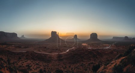 Photo for Panoramic view of Monument Valley USA Utah during Sunset and sunrise with famout view to the sisters and west mitten butte. Photo taken in Utah - Royalty Free Image