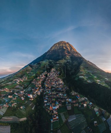 Photo for Aerial Drone View of Nepal van Java in front of mount sumbing. The Beauty Of Building Houses In The Countryside Of The Mountainside In The Morning. Nepal van Java Is A Rural Tour On The Slopes Of - Royalty Free Image