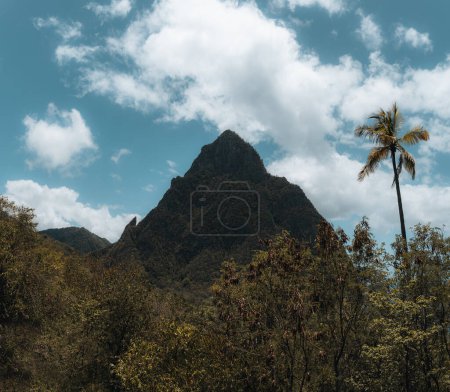 Photo for Soufriere, St Lucia from an overlook with the world famous Pitons in the background and beautiful blue Caribbean waters and a partly cloudy day - Royalty Free Image