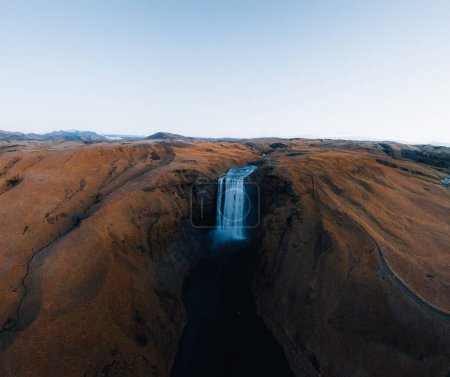 Photo for Iceland. Aerial view on the Skogafoss waterfall. Landscape in the Iceland from air. Famous place in Iceland. Landscape from drone. Travel concept. Sunset and sunrise. Soft light - Royalty Free Image