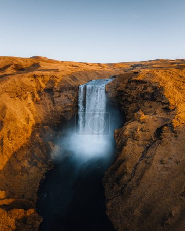 Photo for Iceland. Aerial view on the Skogafoss waterfall. Landscape in the Iceland from air. Famous place in Iceland. Landscape from drone. Travel concept. Sunset and sunrise. Soft light - Royalty Free Image