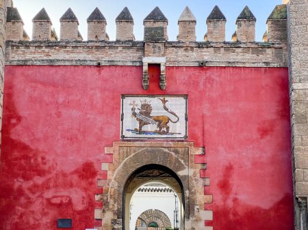 Photo for Seville, Spain - Dec 8, 2021: The Lions Gate, the main entrance of Royal Alcazars of Seville, Spain. - Royalty Free Image