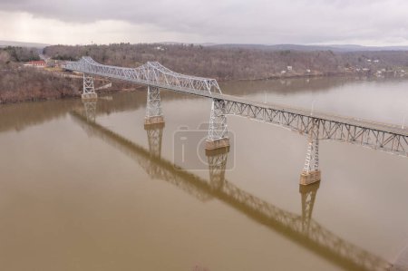 Photo for Aerial view of the Rip Van Winkle Bridge spanning the Hudson River between Catskill, NY and Hudson NY - Royalty Free Image