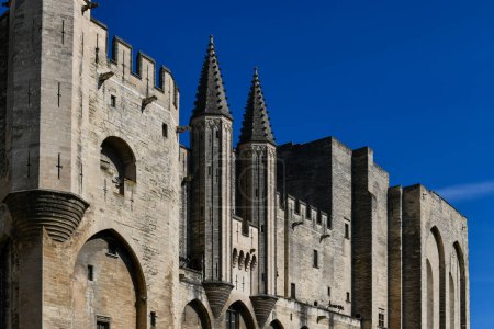 Photo for Palace of the Popes, once fortress and palace, one of the largest and most important medieval Gothic buildings in Europe in Avignon, France. - Royalty Free Image