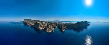 Photo for Aerial view of Calanque de Figuerolles, a snug cove framed by rugged cliffs in France. - Royalty Free Image
