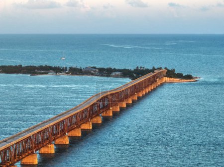 The old Bahia Honda Railroad Bridge with the new Bahia Honda Bridge on the background, Florida Keys, USA.