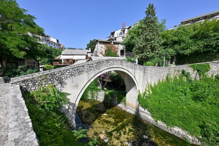 Crooked bridge or Kriva cuprija over Radobolja river in Mostar, Bosnia and Herzegovina.