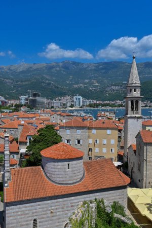 View of Budva old town streets, Budva Municipality and Riviera, resort on the Adriatic sea coast, Montenegro, sunny day with a blue sky, cathedral and citadel Montenegro.