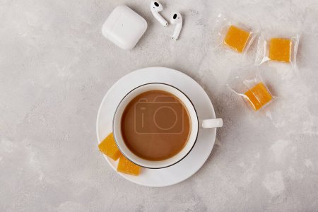 Photo for Coffee break harmony - creative compositions with dry mango pieces and earphones. Time for yourself - Royalty Free Image