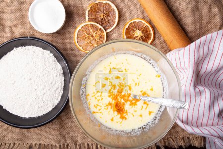 Photo for Kitchen Craft - whisking Batter with Citrus Zest - Royalty Free Image