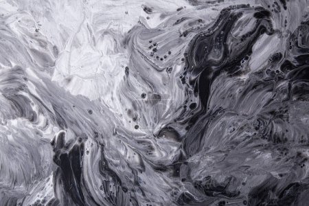 Textured grayscale fluid art for contemporary creative backgrounds. Fluid art, marble background.