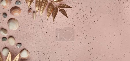 Chic summer beach theme with golden leaves on a pink surface with copy space.