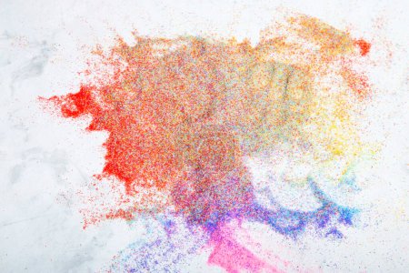 Rainbow powder explosion in a burst of color. Abstract background.