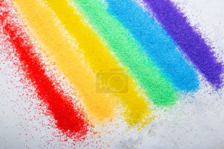 Photo for Multicolored sand spread artfully for Creative Background LGBTQ people. Concept of homosexual, gay community, tolerant LGBTQ society - Royalty Free Image