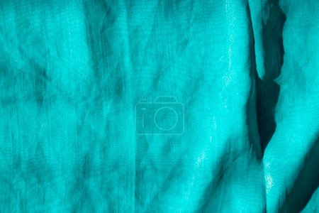 Serene Teal Waves - Textured Fabric Detail background.