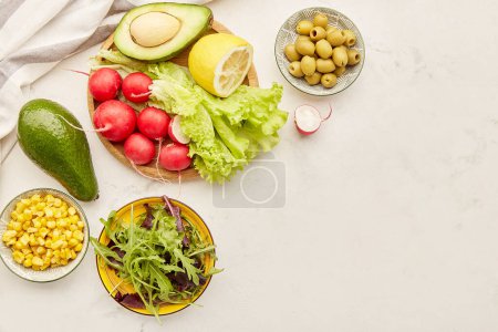 Fodmap ingredients, plant based diet, vegetables and fruits, greens, olives. Fodmap, Paleo diet concept with copy space.