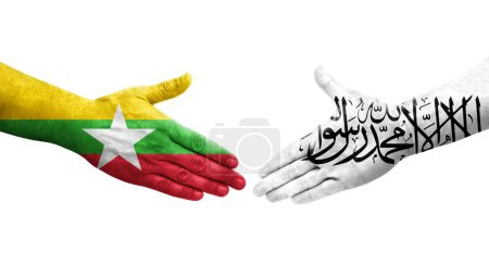 Foto de Apretón de manos entre Afganistán y Myanmar banderas pintadas en las manos, imagen transparente aislada. - Imagen libre de derechos