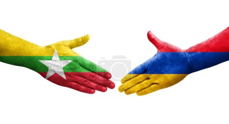 Foto de Apretón de manos entre Armenia y Myanmar banderas pintadas en las manos, imagen transparente aislada. - Imagen libre de derechos