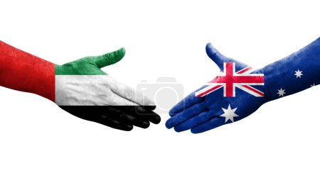 Foto de Apretón de manos entre Australia y Emiratos Árabes Unidos banderas pintadas en las manos, imagen transparente aislada. - Imagen libre de derechos