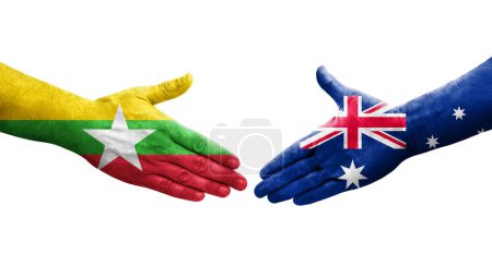 Foto de Apretón de manos entre Australia y Myanmar banderas pintadas en las manos, imagen transparente aislada. - Imagen libre de derechos