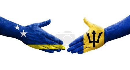 Foto de Apretón de manos entre Barbados y Curazao banderas pintadas en las manos, imagen transparente aislada. - Imagen libre de derechos