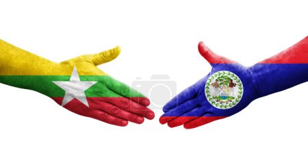 Foto de Apretón de manos entre Belice y Myanmar banderas pintadas en las manos, imagen transparente aislada. - Imagen libre de derechos
