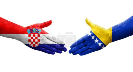 Foto de Apretón de manos entre Bosnia y Croacia banderas pintadas en las manos, imagen transparente aislada. - Imagen libre de derechos