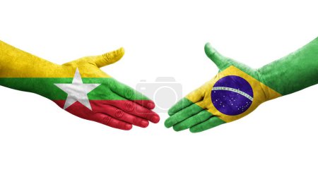 Foto de Apretón de manos entre Brasil y Myanmar banderas pintadas en las manos, imagen transparente aislada. - Imagen libre de derechos
