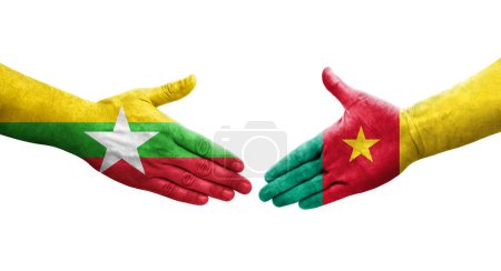 Foto de Apretón de manos entre Camerún y Myanmar banderas pintadas en las manos, imagen transparente aislada. - Imagen libre de derechos