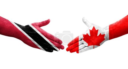 Téléchargez les photos : Poignée de main entre le Canada et Trinité-et-Tobago drapeaux peints sur les mains, image transparente isolée. - en image libre de droit