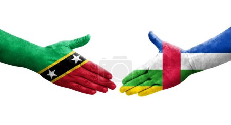 Photo for Handshake between Central African Republic and Saint Kitts and Nevis flags painted on hands, isolated transparent image. - Royalty Free Image