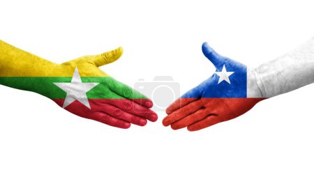 Foto de Mano apretada entre Chile y Myanmar banderas pintadas en las manos, imagen transparente aislada. - Imagen libre de derechos