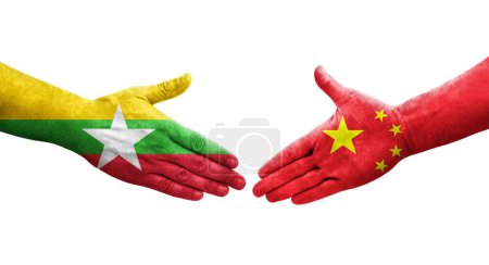 Foto de Apretón de manos entre China y Myanmar banderas pintadas en las manos, imagen transparente aislada. - Imagen libre de derechos
