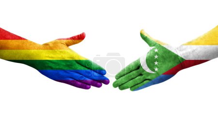 Photo for Handshake between Comoros and LGBT flags painted on hands, isolated transparent image. - Royalty Free Image