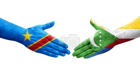 Photo for Handshake between Comoros and Dr Congo flags painted on hands, isolated transparent image. - Royalty Free Image
