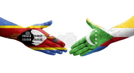 Photo for Handshake between Comoros and Eswatini flags painted on hands, isolated transparent image. - Royalty Free Image