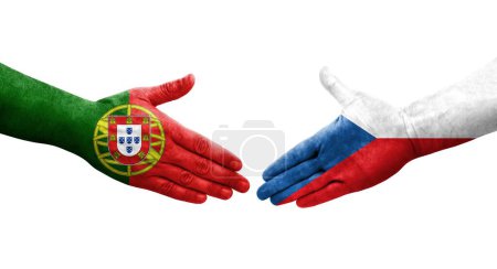 Photo for Handshake between Czechia and Portugal flags painted on hands, isolated transparent image. - Royalty Free Image